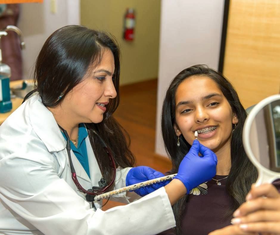 Dr. Saboowala with a patient